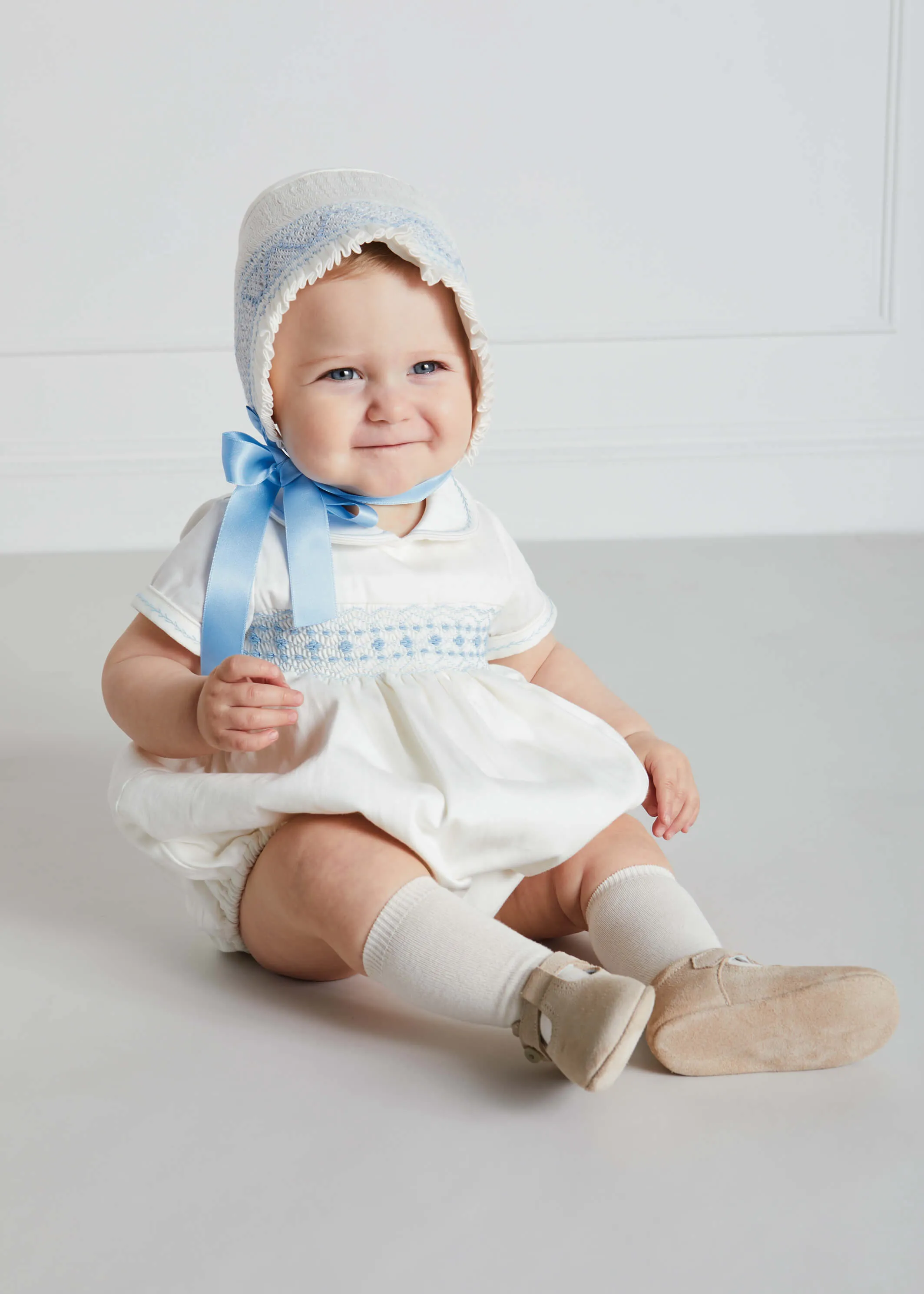 Classic Off-White Blue Handsmocked Romper (3-18mths)