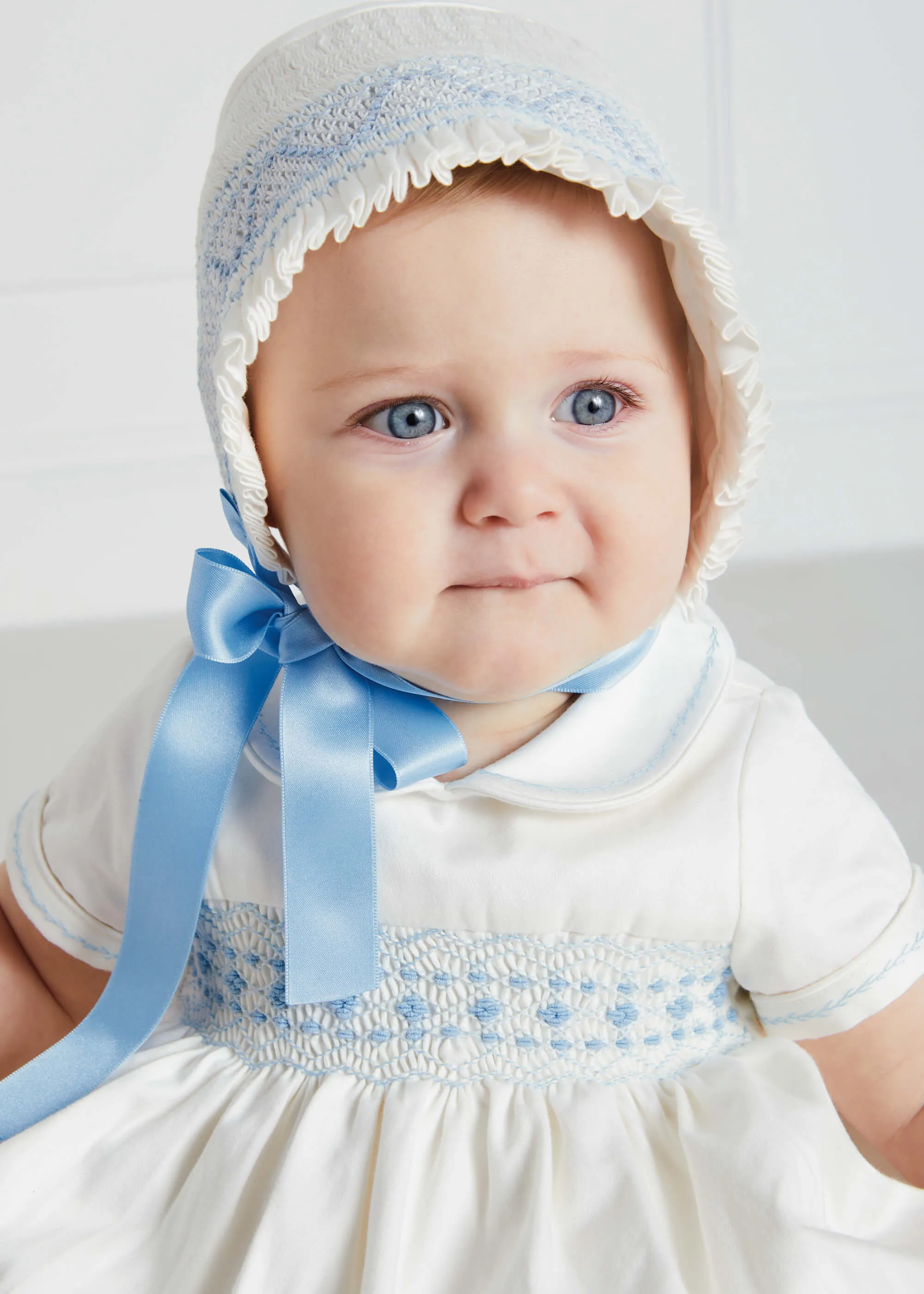 Classic Off-White Blue Handsmocked Romper (3-18mths)