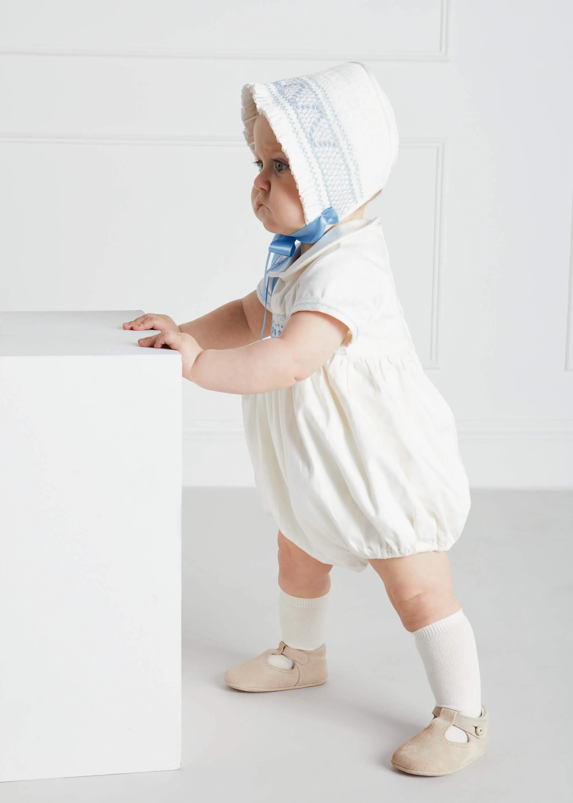 Classic Off-White Blue Handsmocked Romper (3-18mths)