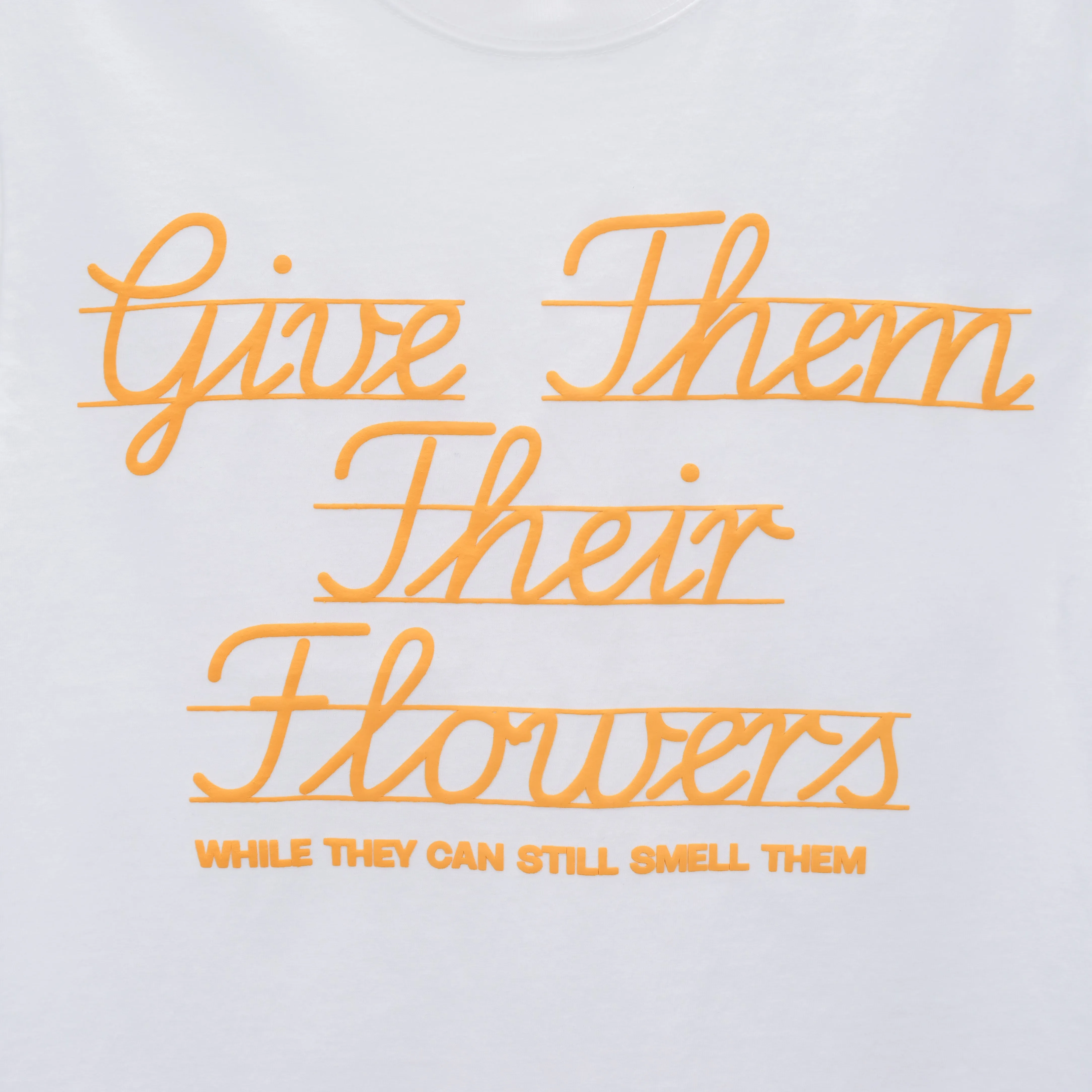 GIVE THEM THEIR FLOWERS SPELL OUT TEE WHITE