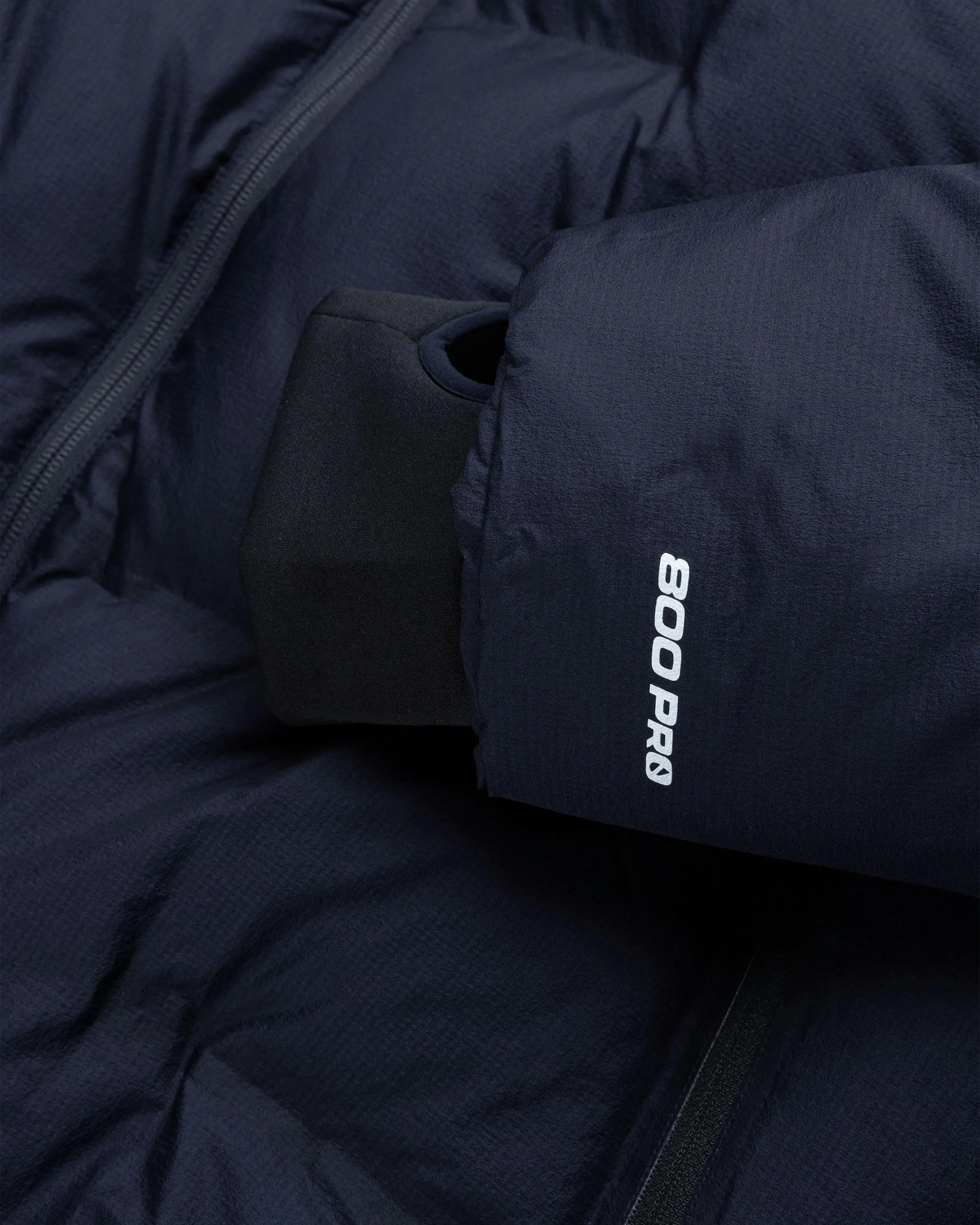 The North Face x UNDERCOVER – Soukuu Cloud Down Nupste Parka Black/Navy | Highsnobiety Shop